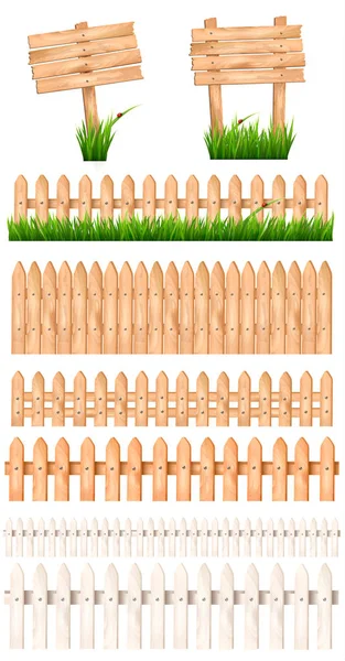 Set of wooden signs and a fences with grass. Vector. — Stock Vector