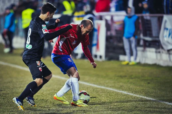 Galati, Rumunsko - 5. března: Neznámá fotbalistů provádí dur — Stock fotografie