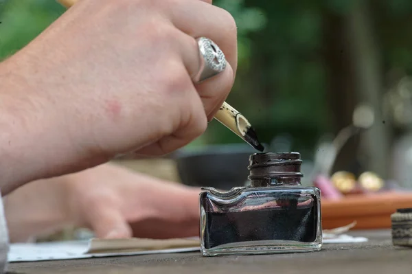 Ink bottle for writing calligraphy like in medieval time — Stock Photo, Image