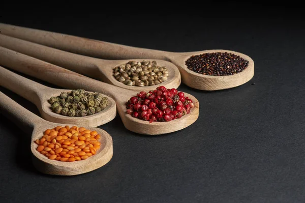 Various of spices in wooden spoons — Stock Photo, Image