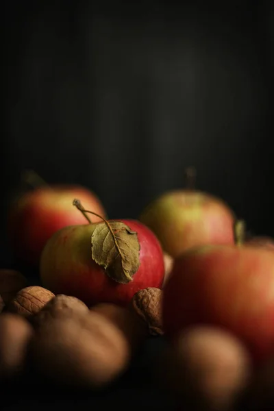 Red apples on black background — Stock Photo, Image