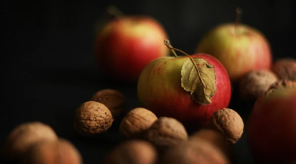 Red apples on black background — Stock Photo, Image