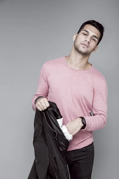 Young Handsome Man Pink Sweater Gray Background Studio Portrait — Stock Photo, Image