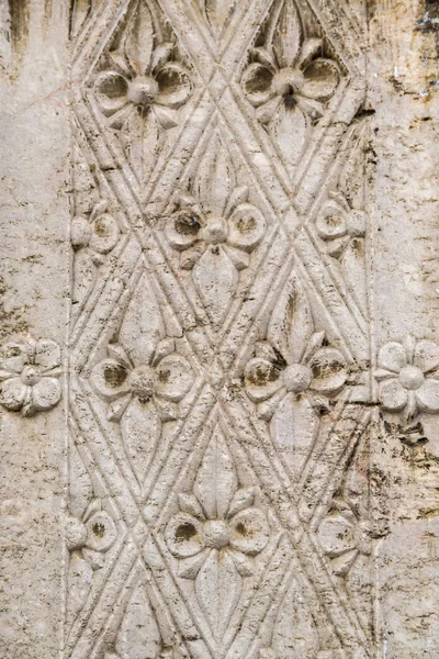 Orientale pietra floreale intaglio primo piano texture — Foto Stock