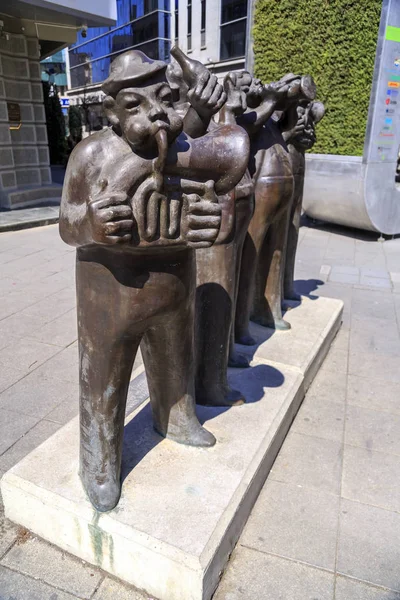Escultura em bronze de músicos estilizados — Fotografia de Stock