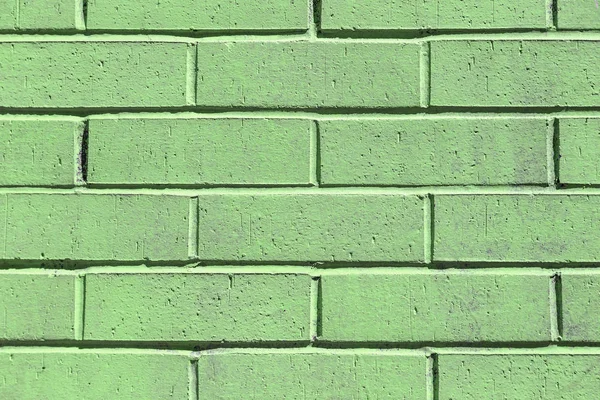 Parede de tijolo pintado verde — Fotografia de Stock