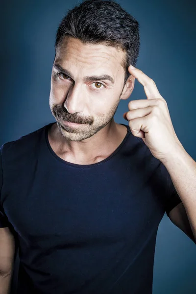 Young handsome man with beard and mustache studio portrait — Stock Photo, Image