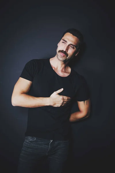 Young handsome man with beard and mustache studio portrait — Stock Photo, Image
