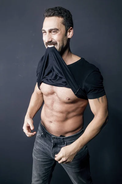 Young handsome man with beard and mustache studio portrait — Stock Photo, Image