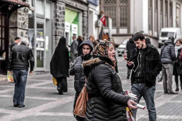 Turkish lady selling band aids — Stok fotoğraf