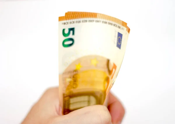 Hombre Sostiene Una Pila Billetes Euros Colocados Aislados Sobre Fondo — Foto de Stock