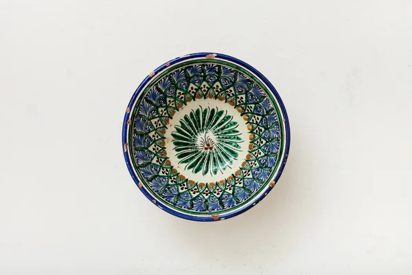 Typical central asian bowl on plastering plate — Stockfoto