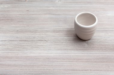 aşkına gri kahverengi ahşap tahta üzerinde beyaz Kupası