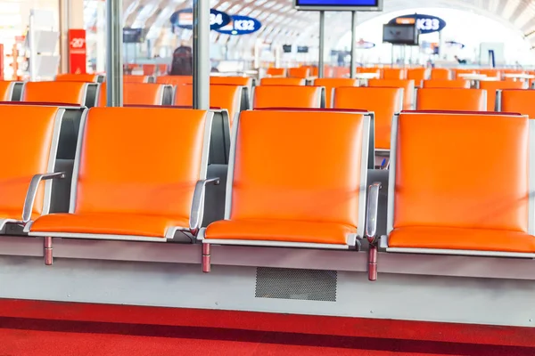 Empty seat in departure area of airport — Stock Photo, Image