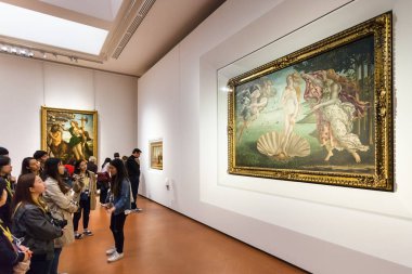 tourists in Botticelli room of Uffizi Gallery clipart
