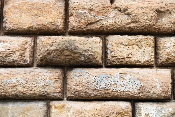 Rijen van bruine blokken in de muur van Palazzo Pitti — Stockfoto