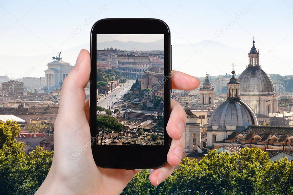 tourist photographs roman forums in Rome
