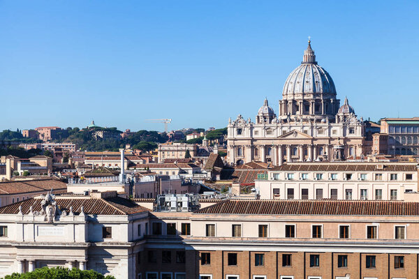 Travel to Italy - view of St Peter's Basilica in Vatican city and buildings in Borgo district in Rome Castel of Holy Angel