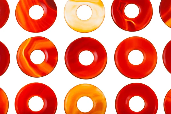 Beaucoup de forme de donut poli agate cercles de pierres précieuses — Photo