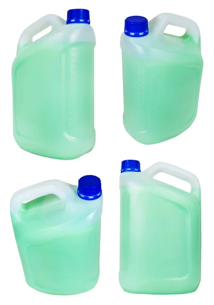 Set aus Plastikkanistern mit grüner Flüssigkeit — Stockfoto