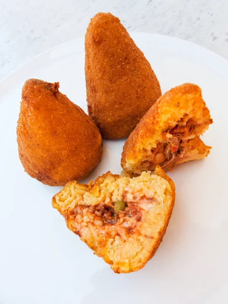 Traditional arancini on white plate in Sicily — Stock Photo, Image