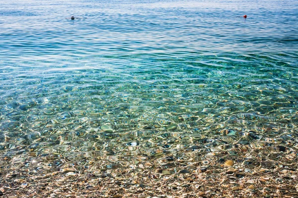 Vatten på stranden Marina di Cottone på Joniska havet — Stockfoto