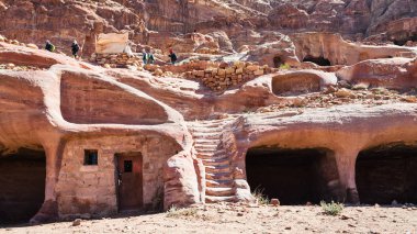 bedouin house in ancient cave in Petra town clipart