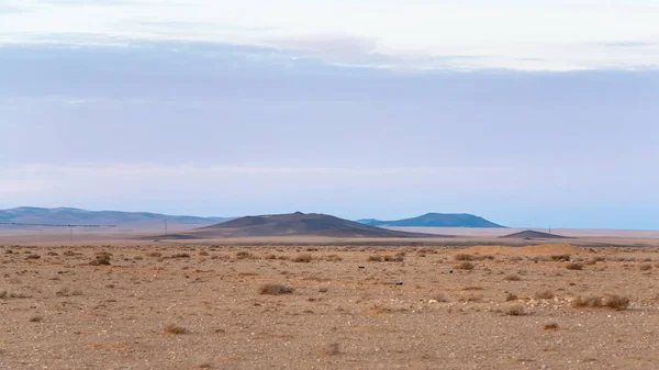 Pustina podél pouštní silnice (silnice č. 15) v Jordánsku — Stock fotografie