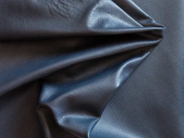 Crumpled piece of black cattle leather — 스톡 사진