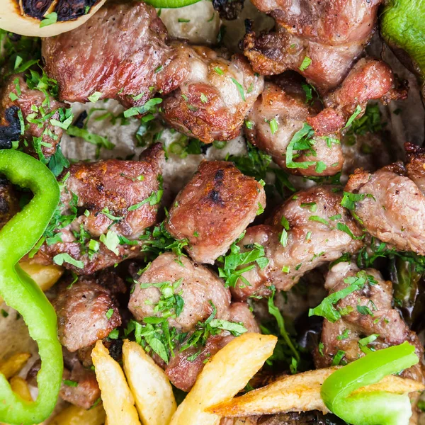 Top view of many pieces of arabian lamb kebab — Stock Photo, Image