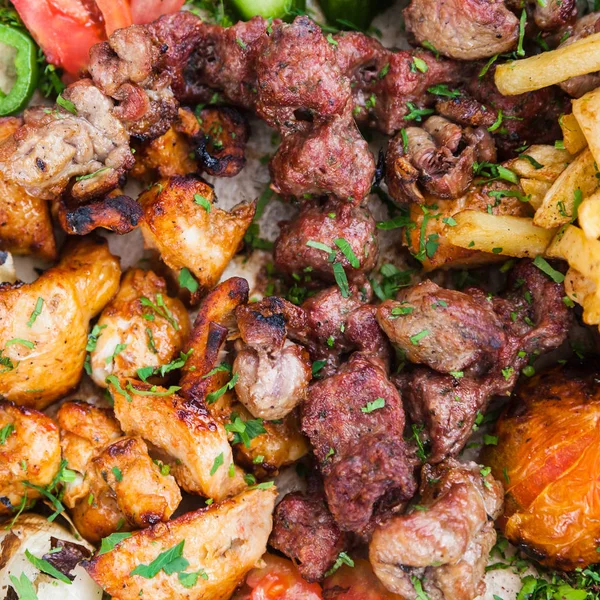 Many pieces of kebab from veal, lamb and chicken — Stock Photo, Image