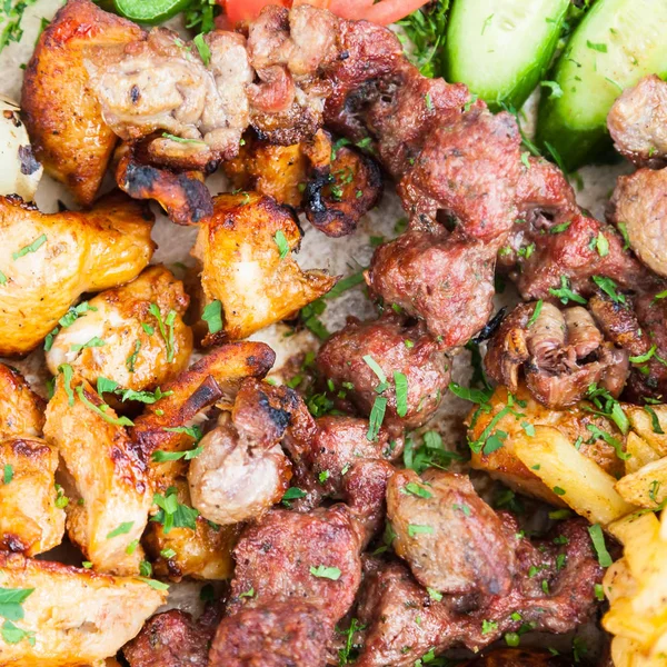 Many pieces of arabian kebab from various meats — Stock Photo, Image