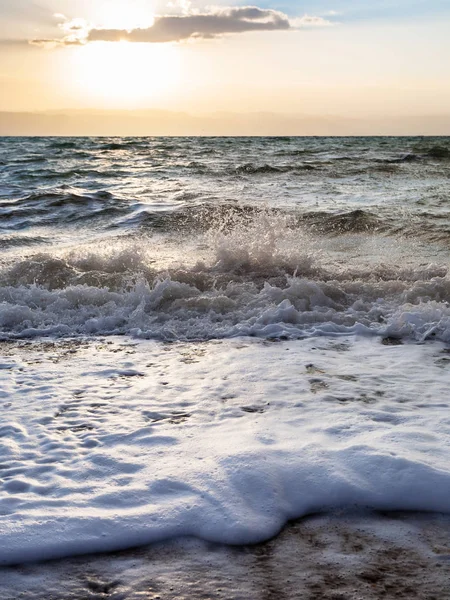 Surf at Dead Sea in winter dusk — Stock Photo, Image
