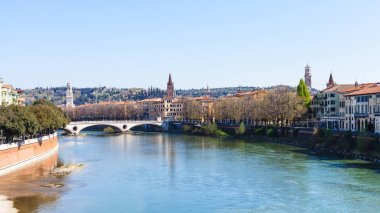 Adige river with Ponte della vittoria in Verona