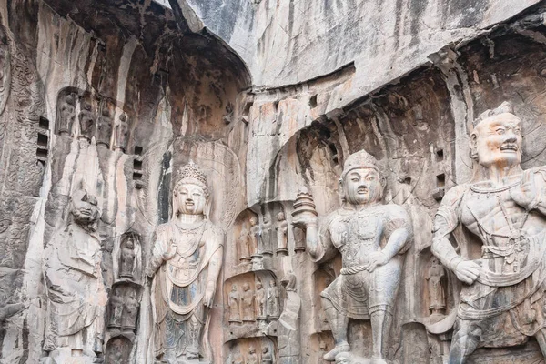 Carved Buddhist statues in the main Longmen Grotto — Stock Photo, Image