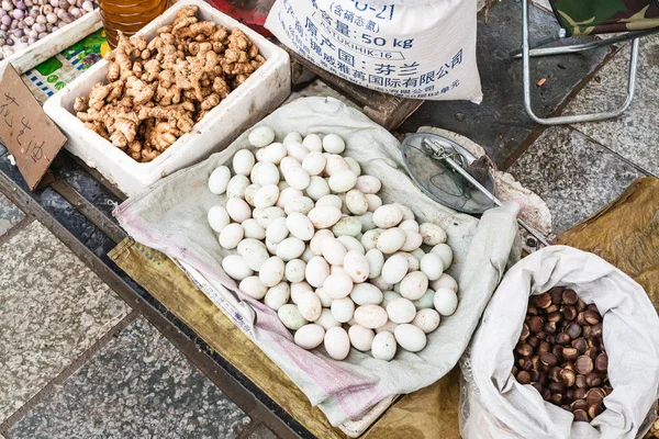 Eggs, gingers, chestnuts on street outdoor market — Stock Photo, Image