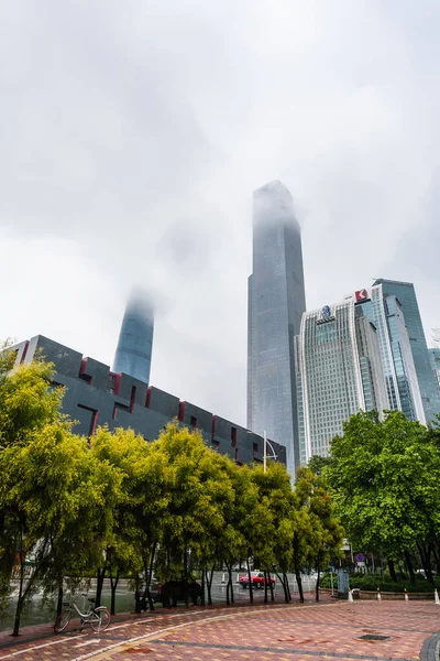 Fog over towers on quay in Guangzhou city — Stock Photo, Image