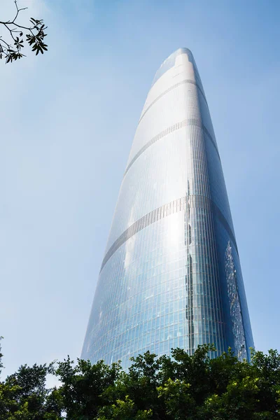 Glass skyscraper in Guangzhou city in spring — Stock Photo, Image