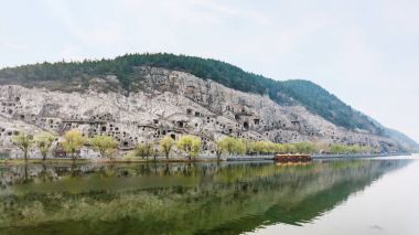 panoramic view of West Hill with caves clipart