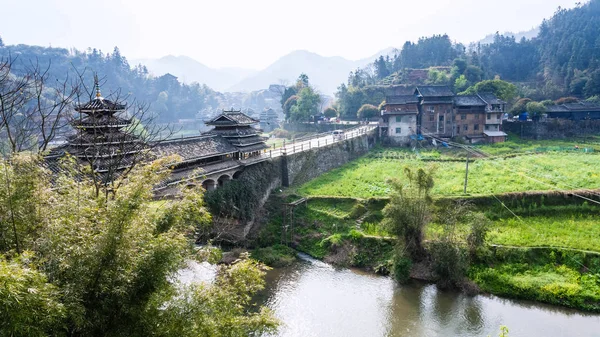 Dong people Bridge and gardens in Chengyang — Stock Photo, Image