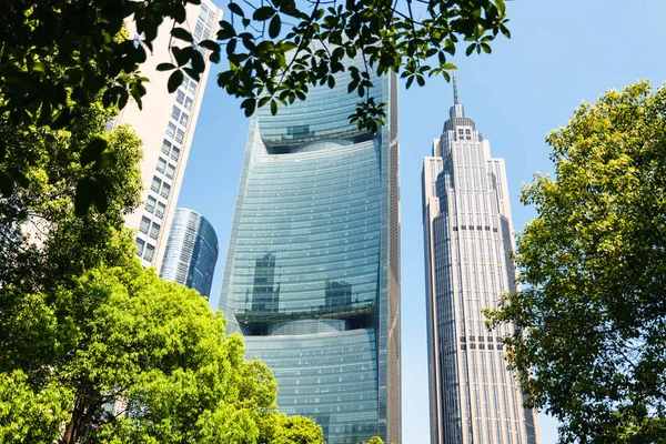 Modern glass buildings in Guangzhou city in spring — Stock Photo, Image