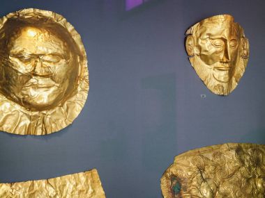 golden death masks in Museum in Athens clipart