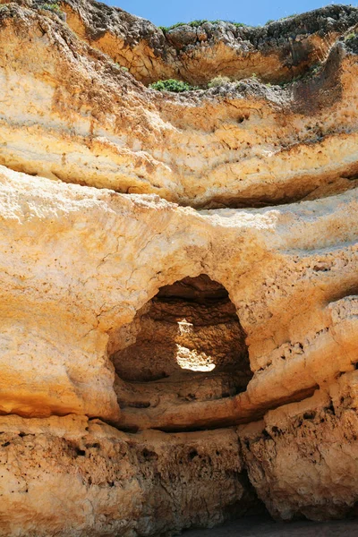 Cave in eroded sandstone rock near Albufeira — Stock Photo, Image