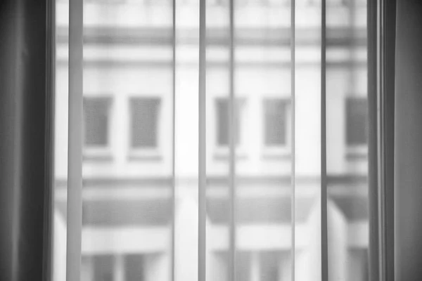 Transparent curtain from tulle fabric on window — Stock Photo, Image