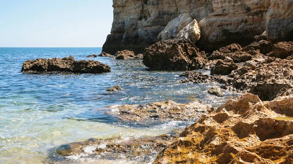Rocks on coastline of beach Praia Maria Luisa — Stock Photo, Image