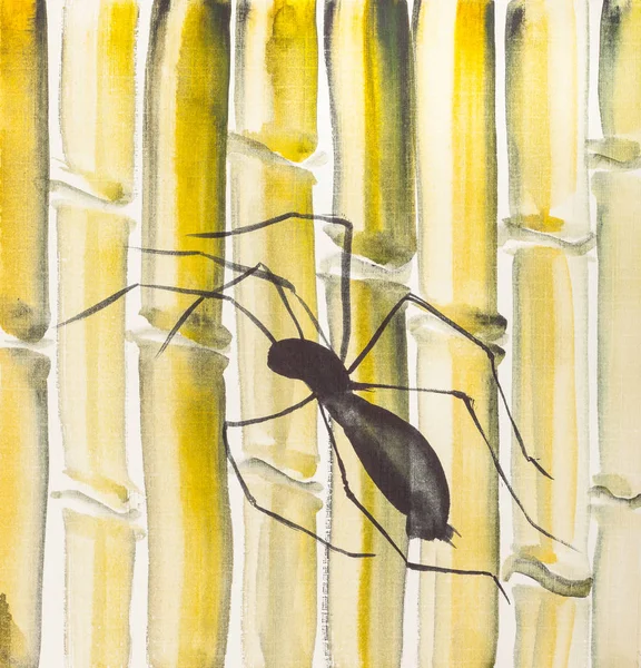 Павук на жовтих бамбукових стовбурах — стокове фото