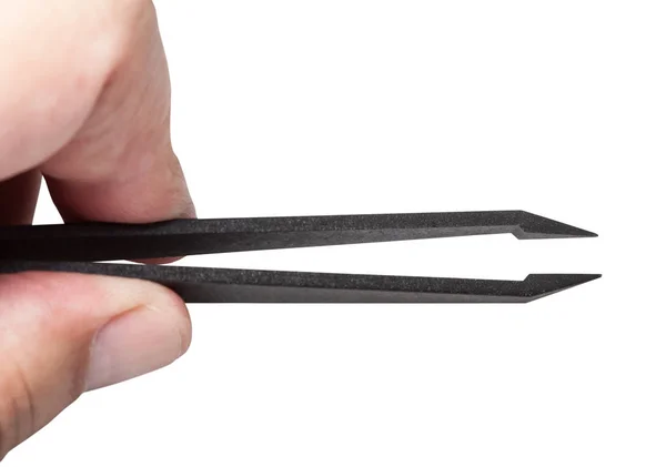 Dedos segurar pinças de plástico com pontas afiadas — Fotografia de Stock