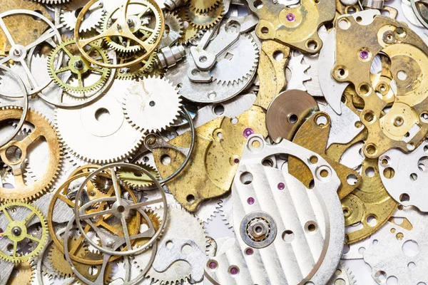 Background from many old watch spare parts — Stock Photo, Image