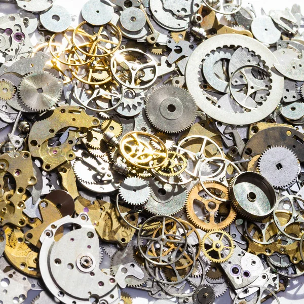 Pile di pezzi di ricambio dell'orologio usati da vicino — Foto Stock