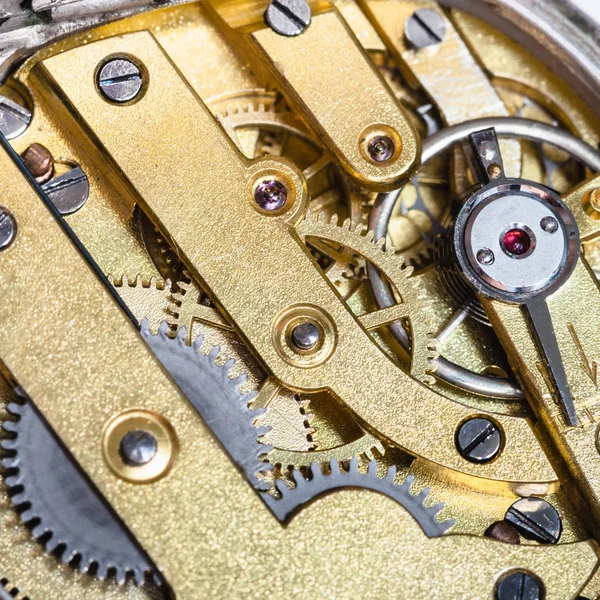 Brass clockwork of old mechanical watch — Stock Photo, Image